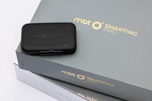 Smarting PRO 32-channel wireless EEG device on its packaging box